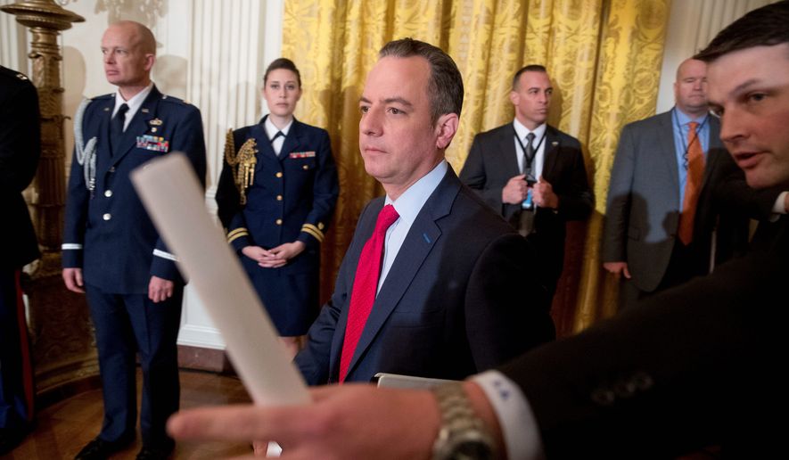 Chief of Staff Reince Priebus (center) took issue with the media&#39;s negative coverage of President Trump&#39;s visit to CIA headquarters Saturday in Virginia, instead describing it as a &quot;lovefest,&quot; with several hundred agents proudly cheering on the new president. (Associated Press)