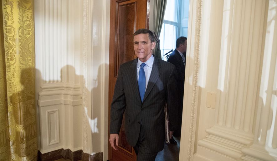 National Security Adviser Michael Flynn arrives for a White House senior staff swearing in ceremony in the East Room of the White House, Sunday, Jan. 22, 2017, in Washington. (AP Photo/Andrew Harnik)