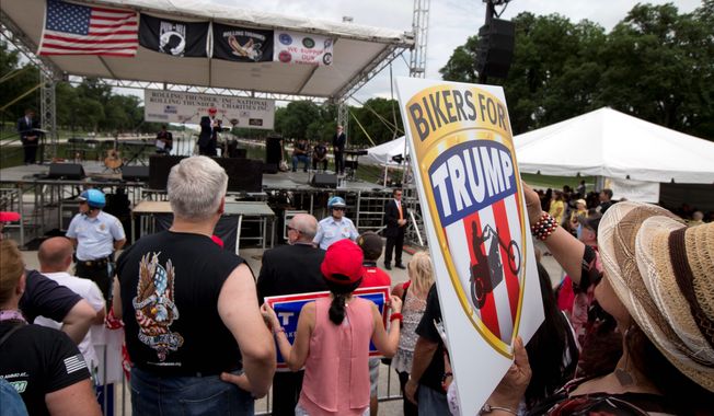 Supporters and bikers at a Rolling Thunder rally on the National Mall listen to GOP presidential candidate Donald Trump speak. The organization offered an invitation for candidates to speak, but only Mr. Trump accepted.