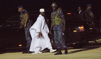Gambia&#39;s defeated leader Yahya Jammeh departs at Banjul airport Saturday Jan. 21, 2017. Jammeh announced early Saturday he has decided to relinquish power, after hours of last-ditch talks with regional leaders and the threat by a regional military force to make him leave. (AP Photo/Jerome Delay)