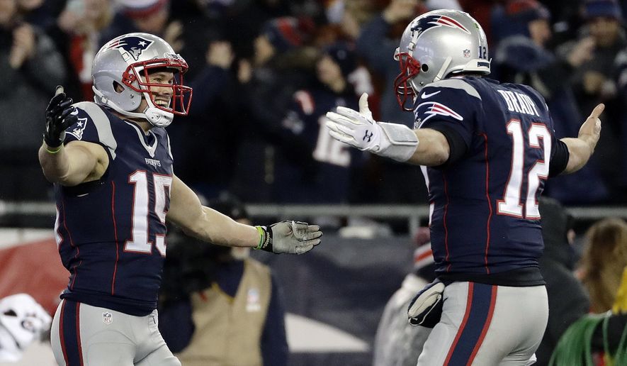 New England Patriots wide receiver Chris Hogan (15) celebrates with quarterback Tom Brady (12) after a touchdown during the first half of the AFC championship NFL football game against the Pittsburgh Steelers, Sunday, Jan. 22, 2017, in Foxborough, Mass. (AP Photo/Matt Slocum)