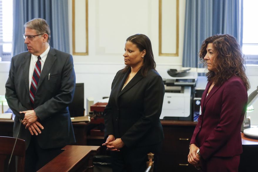 From left, Chief Assistant Prosecutors Seth Tieger, Stacey Graffenreid, and defense attorney Gwen Callender meet with Hamilton County Judge Leslie Ghiz concerning the retrial of a former University of Cincinnati police officer Ray Tensing in the shooting death of motorist Sam DuBose, Monday, Jan. 23, 2017, in Cincinnati. Ghiz met with attorneys Monday in the Ray Tensing case and told reporters afterward that she wants to make sure that a jury can be seated in Hamilton County. (AP Photo/John Minchillo)
