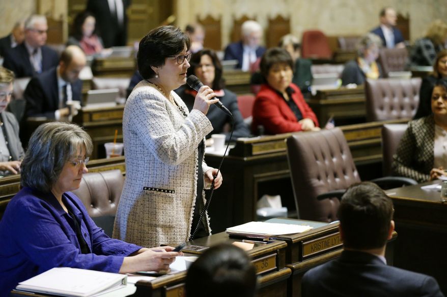 Rep. Kristine Lytton, D-Anacortes, speaks on the House floor, Monday, Jan. 23, 2017, at the Capitol in Olympia, Wash. The House passed a bill Monday that delays a deadline for a reduction in the amount of money school districts can collect through local property tax levies, and it now heads to the Republican-controlled Senate. (AP Photo/Ted S. Warren)