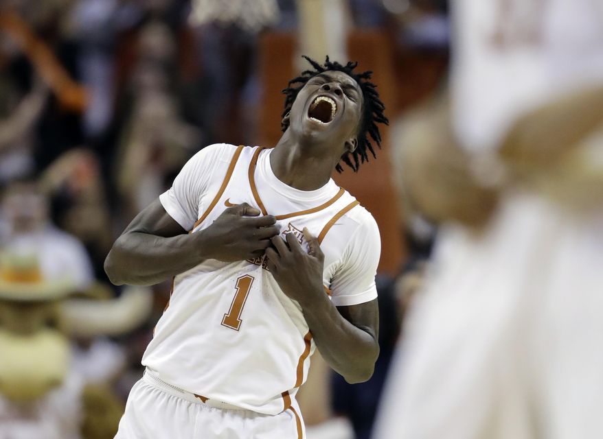 Texas guard Andrew Jones (1) celebrates the team's win over Oklahoma in an NCAA college basketball game, Monday, Jan. 23, 2017, in Austin, Texas. Texas won 84-83. (AP Photo/Eric Gay)