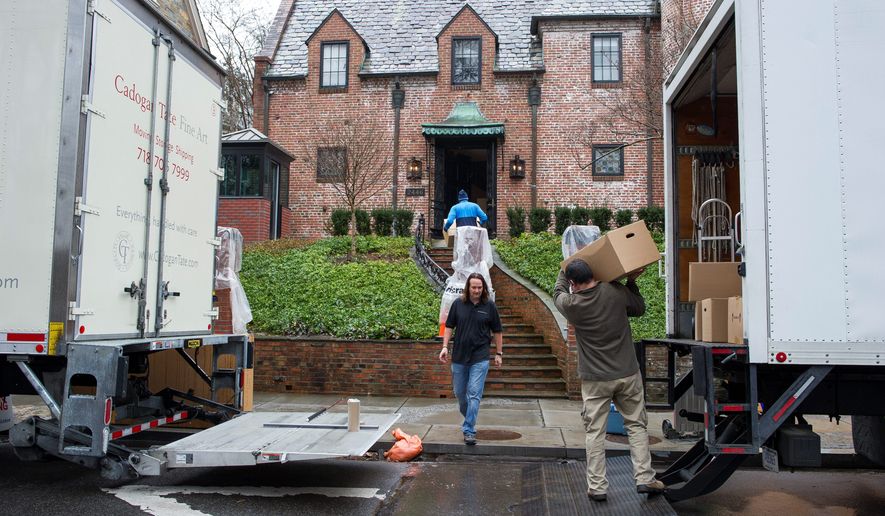 Movers, under the supervision of White House ushers, move President Barack Obama&#39;s family&#39;s belongings into their rented house in the Kalorama neighborhood of Washington, Tuesday, Jan. 17, 2017. (AP Photo/Cliff Owen) (Associated Press)