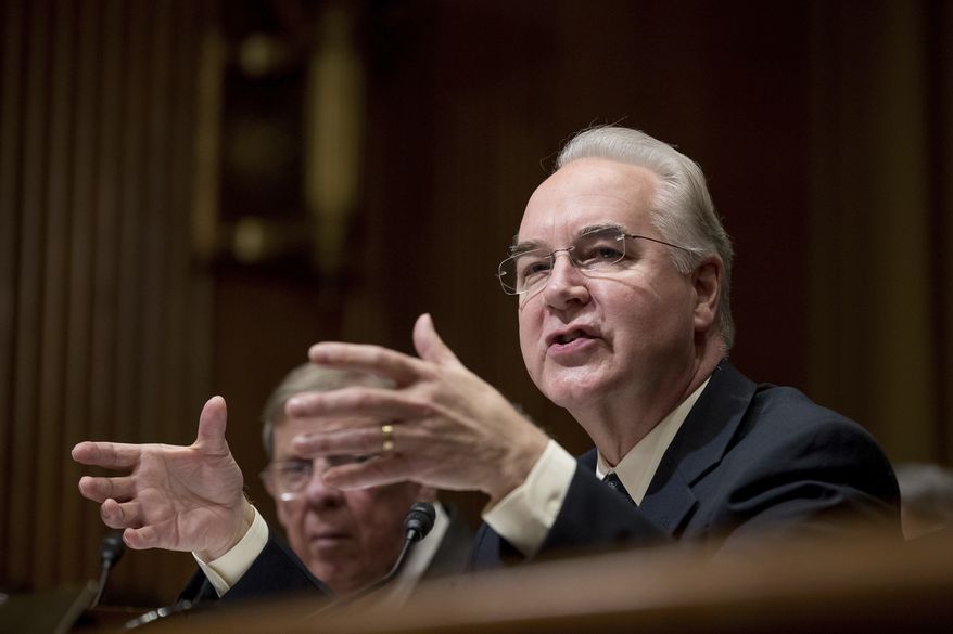 Health and Human Services Secretary-designate, Rep. Tom Price, R-Ga., right, accompanied by Sen. Johnny Isakson, R-Ga., testifies on Capitol Hill in Washington, Tuesday, Jan. 24, 2017, at his confirmation hearing before the Senate Finance Committee. (AP Photo/Andrew Harnik)