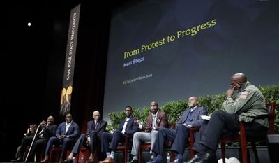 Dr. Harry Edwards, at right, moderates a sports and activism panel entitled &amp;quot;From Protest to Progress: Next Steps&amp;quot; with former and current professional athletes in including, from left, Jim Brown, Takeo Spikes, Kareem Abdul-Jabbar, Chris Webber, Anquan Boldin and Tommie Smith Tuesday, Jan. 24, 2017, in San Jose, Calif. (AP Photo/Marcio Jose Sanchez)
