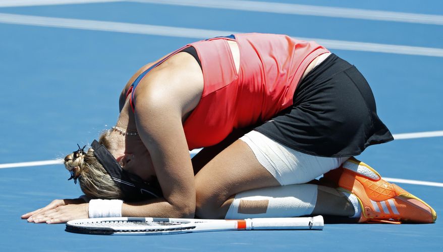 Croatia's Mirjana Lucic-Baroni celebrates after defeating Karolina Pliskova of the Czech Republic during their quarterfinal at the Australian Open tennis championships in Melbourne, Australia, Wednesday, Jan. 25, 2017. (AP Photo/Dita Alangkara)