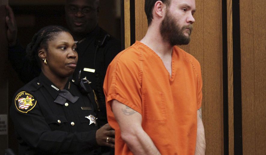In this Feb. 23, 2011 photo, Denny Obermiller, who killed his step-grandfather, and raped and killed his grandmother in 2010, enters the courtroom for the mitigation phase of his death penalty trial in Cleveland. The U.S. Supreme Court on Monday, Jan. 23, 2017, declined to hear Obermiller's appeal, who was sentenced to die in 2011 after he pleaded guilty to multiple charges of aggravated murder, kidnapping, rape, aggravated robbery, aggravated theft, burglary, attempted aggravated arson and tampering with evidence. (Joshua Gunter/The Plain Dealer via AP)