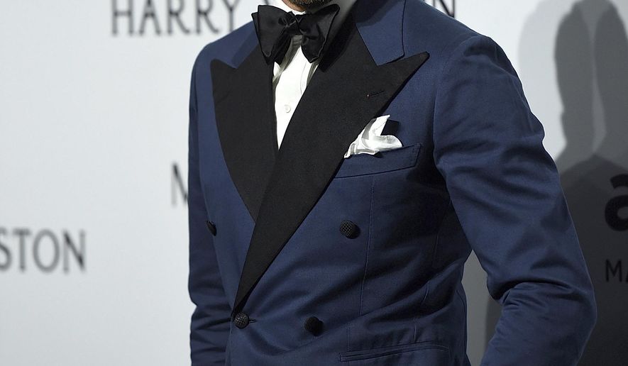 FILE - In this Sept. 26, 2015 file photo, Lapo Elkann arrives for an amfAR charity dinner in Milan, Italy. A criminal charge by the Manhattan district attorney has been dropped against the playboy grandson of the Italian founder of Fiat Automobiles who had been accused of filing a false report when he claimed he was being held against his will in New York City. The 39-year-old was arrested outside a public housing project in December 2016 after his family contacted police, saying he needed $10,000 to guarantee his safety. But authorities say he made up the story after he ran out of money following a two-day binge with an escort. (AP Photo/Giuseppe Aresu, File)