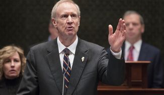 Illinois Gov. Bruce Rauner delivers his State of the State address in the Illinois House chamber Wednesday, Jan. 25, 2017 in Springfield, Ill.  Rauner called on lawmakers to work with him to resolve Illinois&#39; budget crisis, saying both parties agree something needs to change.  (Ted Schurter/The State Journal-Register via AP)