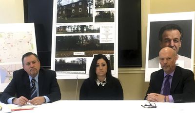 Attorneys Leander James, left, and Patrick Noaker, right, flanking client Lindsay Tornambe, center, at a news conference on Wednesday, Jan. 25, 2017, in Spokane, Wash. The attorneys and their client contend that members of a Minnesota religious sect have moved to Washington state and may be abusing children. (AP Photo/Nicholas K. Geranios)