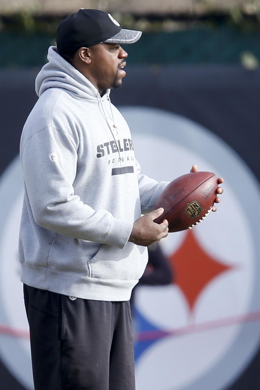 FILE-- This file photo from Jan. 13, 2017 shows Pittsburgh Steelers linebackers coach Joey Porter during NFL football practice in Pittsburgh. The director of the Pittsburgh Police Citizens Review Board says video of the arrest of Steelers assistant coach Joey Porter on Jan. 8, 2017, supports an officer's version of the events, including that Porter grabbed the officer's wrists, rendering him defenseless. (AP Photo/Keith Srakocic, File)