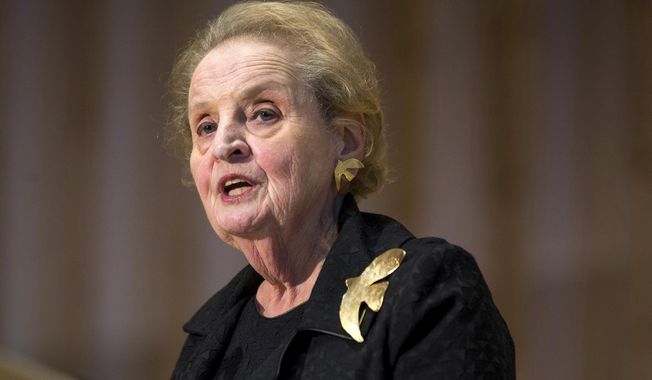 In this Oct. 6, 2016, file photo, former U.S. Secretary of State Madeleine Albright speaks during a memorial service for former Israel Prime Minister Shimon Peres at Adas Israel Congregation in Washington. Albright tweeted on Jan. 25, 2017, that she is ready to register as Muslim as a show of solidarity. (AP Photo/Zach Gibson, File)