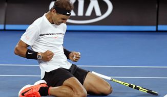Spain&#39;s Rafael Nadal celebrates after defeating Canada&#39;s Milos Raonic during their quarterfinal at the Australian Open tennis championships in Melbourne, Australia, Wednesday, Jan. 25, 2017. (AP Photo/Kin Cheung)