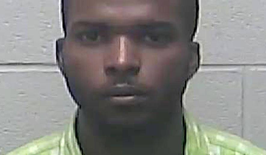This undated photo provided by Burleigh County Sheriff's Department Detention Center in Bismarck, N.D. shows Lavrick Willocks. Willocks, a Jamaican man accused of being the kingpin of a multimillion-dollar lottery scam that victimized dozens of people across the U.S., pleaded not guilty on Thursday, Jan. 26, 2017, in federal court in North Dakota. He is charged with conspiracy, wire fraud, mail fraud and money laundering. Authorities allege the sophisticated schemes that Willocks masterminded bilked more than 70 mostly elderly Americans out of more than $5.6 million. (Burleigh County Sheriff's Dept Detention Center via AP)