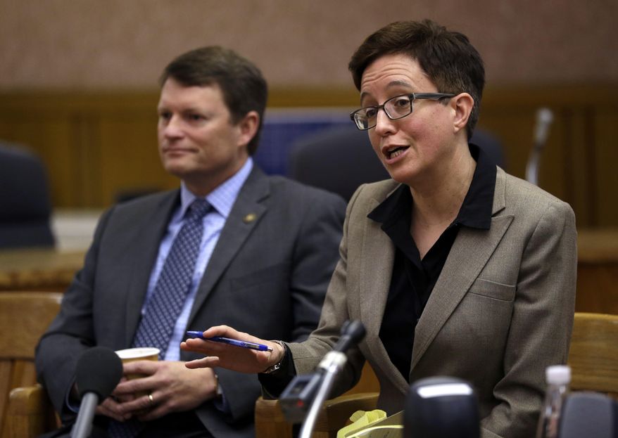 Oregon House Speaker Tina Kotek, D-Portland, right, speaks as Oregon House Minority Leader Mike McClane, R-Powell Butte, listens in Salem, Ore., Thursday, Jan. 26, 2017. Oregon legislative leaders are meeting at the Capitol in a forum with state media representatives to outline agendas for the upcoming legislative session in February. (AP Photo/Don Ryan)