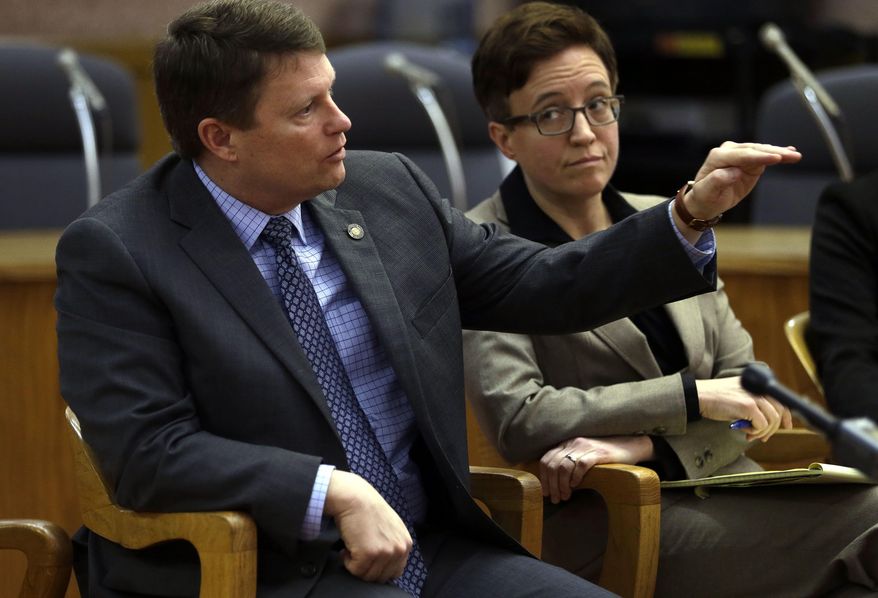 Oregon House Minority Leader Mike McClane, left, R-Powell Butte, talks as House Speaker Tina Kotek, D-Portland, listens in Salem, Ore., Thursday, Jan. 26, 2017. Oregon legislative leaders are meeting at the Capitol in a forum with state media representatives to outline agendas for the upcoming legislative session in February. (AP Photo/Don Ryan)