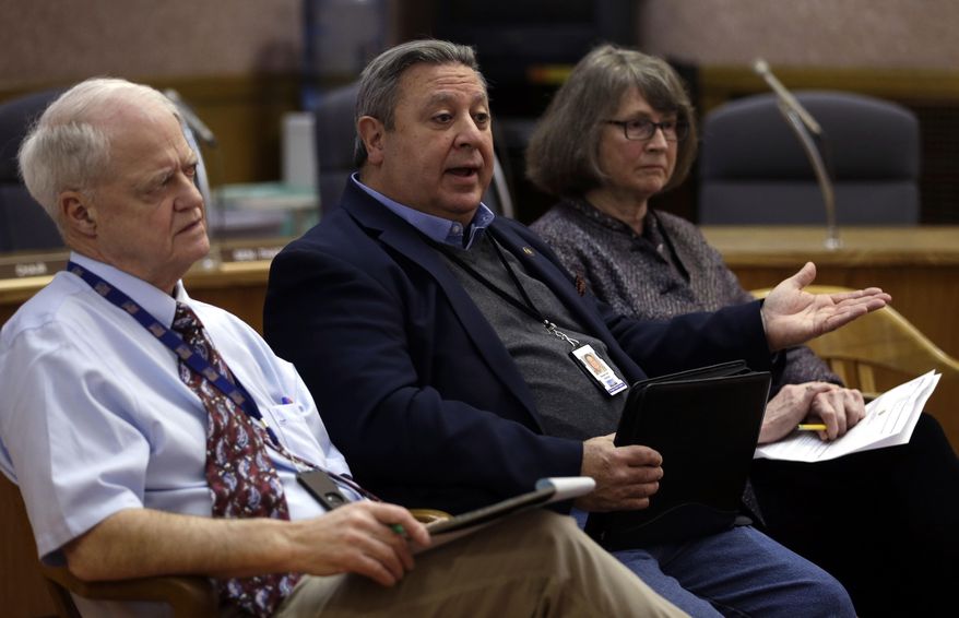 Oregon Senate Minority Leader Ted Ferrioli, middle, R-John Day, speaks as Senate President Peter Courtney, D-Salem, and Senate Majority Leader Ginny Burdick, D-Portland, listen in Salem, Ore., Thursday, Jan. 26, 2017. Oregon legislative leaders are meeting at the Capitol in a forum with state media representatives to outline agendas for the upcoming legislative session in February. (AP Photo/Don Ryan)