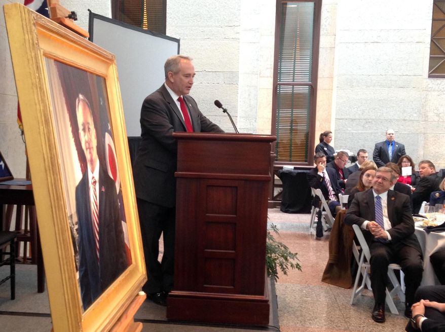 Former Ohio Senate President Keith Faber addresses guests gathered for the unveiling of his official portrait at the Ohio Statehouse, Wednesday, Jan. 25, 2017, in Columbus, Ohio. Faber, a Celina Republican, left the Senate earlier this month due to term limits and has returned to serve in the Ohio House. (AP Photo/Julie Carr Smyth)