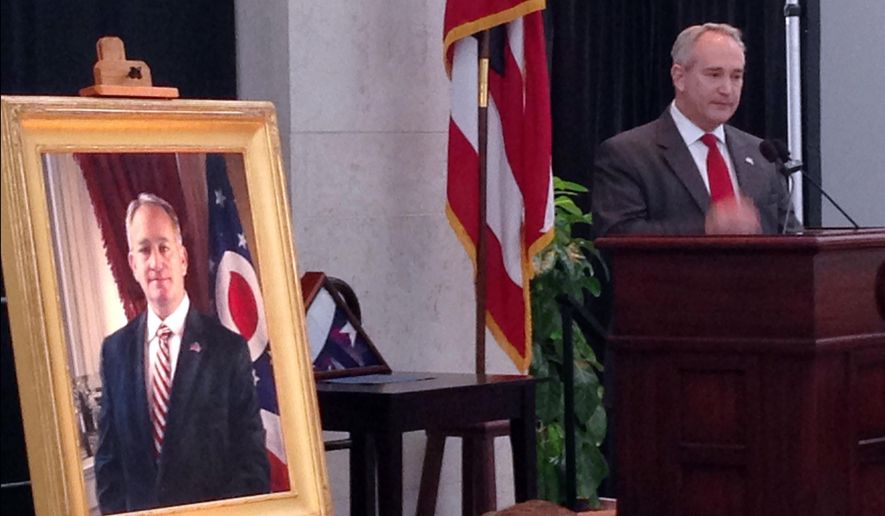 Former Ohio Senate President Keith Faber addresses guests gathered for the unveiling of his official portrait at the Ohio Statehouse, Wednesday, Jan. 25, 2017, in Columbus, Ohio. Faber, a Celina Republican, left the Senate earlier this month due to term limits and has returned to serve in the Ohio House. (AP Photo/Julie Carr Smyth)