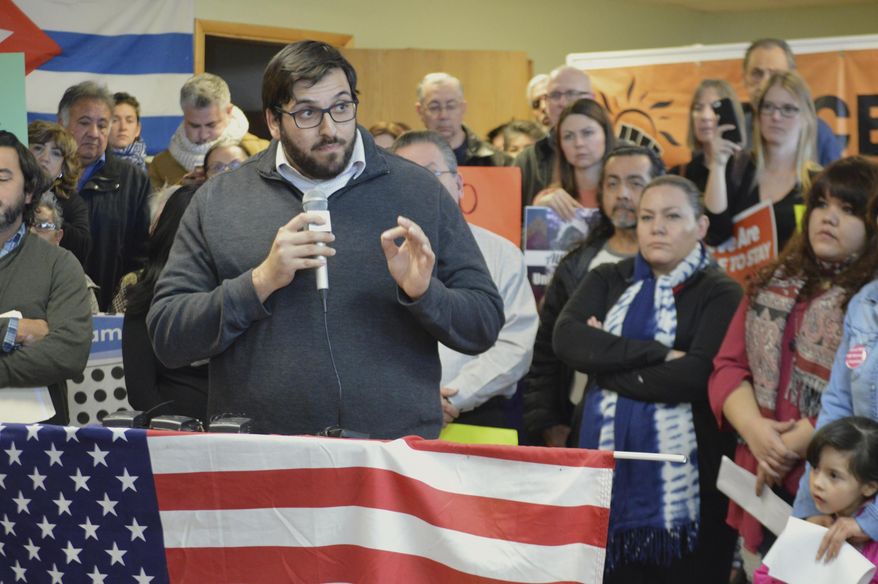Mostafa Amini, secretary of the Islamic Center of New Mexico, speaks at a news conference in Albuquerque, N.M., Wednesday, Jan. 25, 2017 where activists denounced President Donald Trump's executive actions on immigration. Many U.S. Muslim and Latino advocates have been speaking out and preparing lawsuits against executive actions taken by President Donald Trump to build a Mexican border wall and strip funding for immigrant protecting sanctuary cities, as well as anticipated orders to restrict refugees. (AP Photo/Russell Contreras)