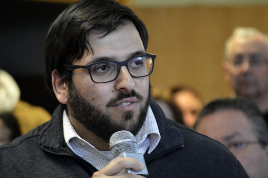 Mostafa Amini, secretary of the Islamic Center of New Mexico, speaks at a news conference in Albuquerque, N.M., Wednesday, Jan. 25, 2017, where activists denounced President Donald Trump's executive actions on immigration. Many U.S. Muslim and Latino advocates have been speaking out and preparing lawsuits against executive actions taken by President Donald Trump to build a Mexican border wall and strip funding for immigrant protecting sanctuary cities, as well as anticipated orders to restrict refugees. (AP Photo/Russell Contreras)