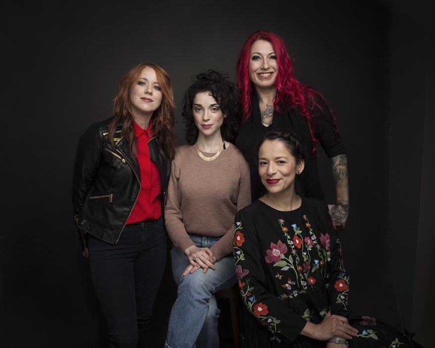 Directors Roxanne Benjamin, from left, Annie Clark, Jovanka Vuckovic and Sofia Carillo pose for a portrait to promote the film, "XX", at the Music Lodge during the Sundance Film Festival on Sunday, Jan. 22, 2017, in Park City, Utah. (Photo by Taylor Jewell/Invision/AP)