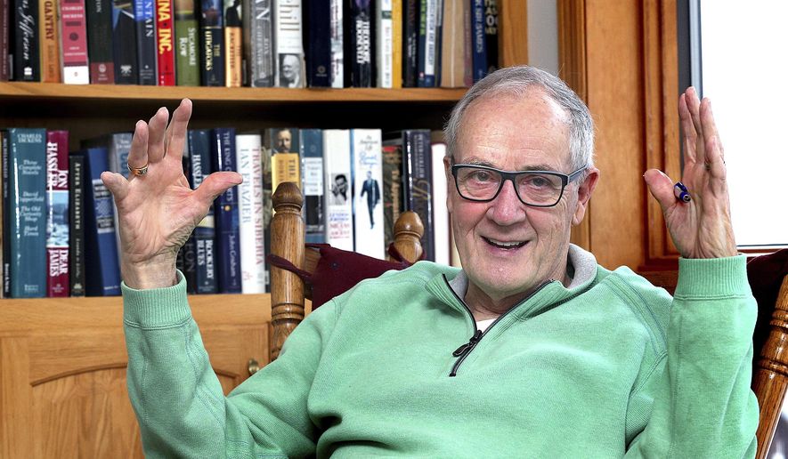 In this Jan. 13, 2017 photo, author Bill Leonard poses at his Onalaska, Wis. home. Leonard has written books about baseball, infamous fires and his childhood neighborhood. He is currently working on a book about local homelessness. (Peter Thomson/La Crosse Tribune via AP)