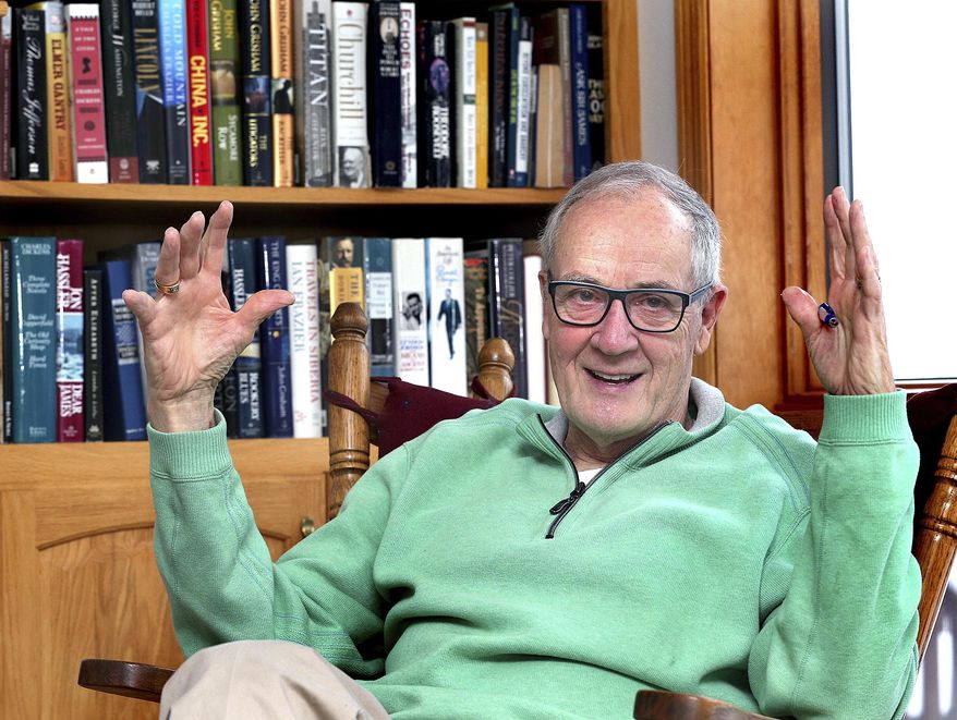 In this Jan. 13, 2017 photo, author Bill Leonard poses at his Onalaska, Wis. home. Leonard has written books about baseball, infamous fires and his childhood neighborhood. He is currently working on a book about local homelessness. (Peter Thomson/La Crosse Tribune via AP)