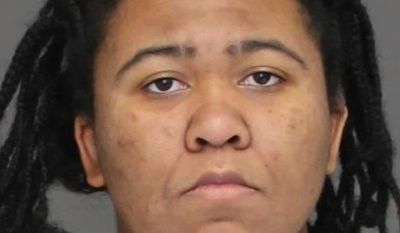 This Jan. 26, 2017 booking photo provided by Charles County, Maryland, Sheriff’s Office shows Bettih Shabazz in La Plata, Md. Shabazz, the granddaughter of Malcolm X, and her mother Malikah Shabazz, are charged with stealing a rental truck that was carrying seven pit bulls in what police say were inhumane conditions. Malikah Shabazz is also charged with animal cruelty. (Charles County, Maryland, Sheriff’s Office via AP)