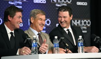 Former NHL hockey players, from left, Wayne Gretzky, Bobby Orr and Mario Lemieux speak during a news conference prior to an NHL 100 ceremony, Friday, Jan. 27, 2017, in Los Angeles. (AP Photo/Mark J. Terrill)