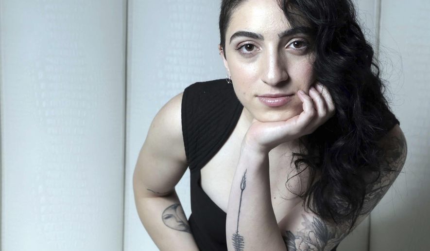 This photo taken Jan. 20, 2017, in Miami shows Emily Estefan. The daughter of Gloria &amp;amp; Emilio releases her debut album on Feb. 3, 2017, a day after her Festival Miami performance. Emily wrote a song featured in her parents&#x27; Broadway musical, On Your Feet, and has her own, edgier, contemporary sound. (José A. Iglesias/El Nuevo Herald via AP)