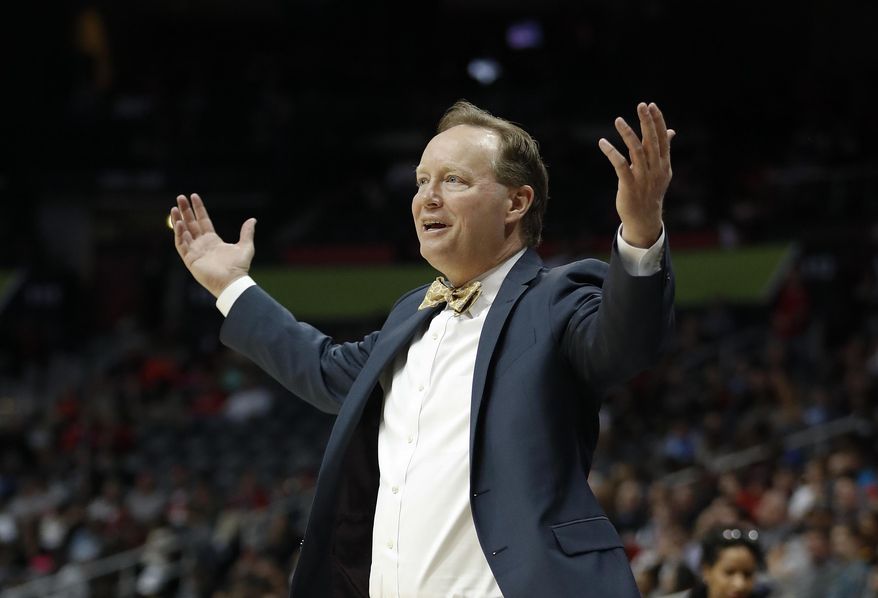 Atlanta Hawks coach Mike Budenholzer reacts after his team was charged with a foul during the second half of an NBA basketball game against the Washington Wizards on Friday, Jan. 27, 2017, in Atlanta. Washington won 112-86. (AP Photo/John Bazemore)