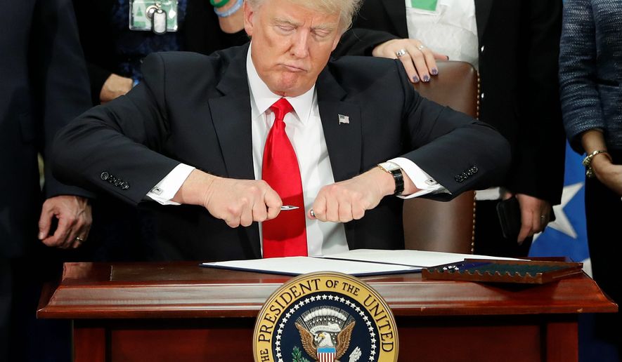 President Trump has had a busy first week in office, signing 17 executive orders, including a controversial measure to effectively ban travelers from several Middle Eastern countries from entering the U.S. (Associated Press photographs)