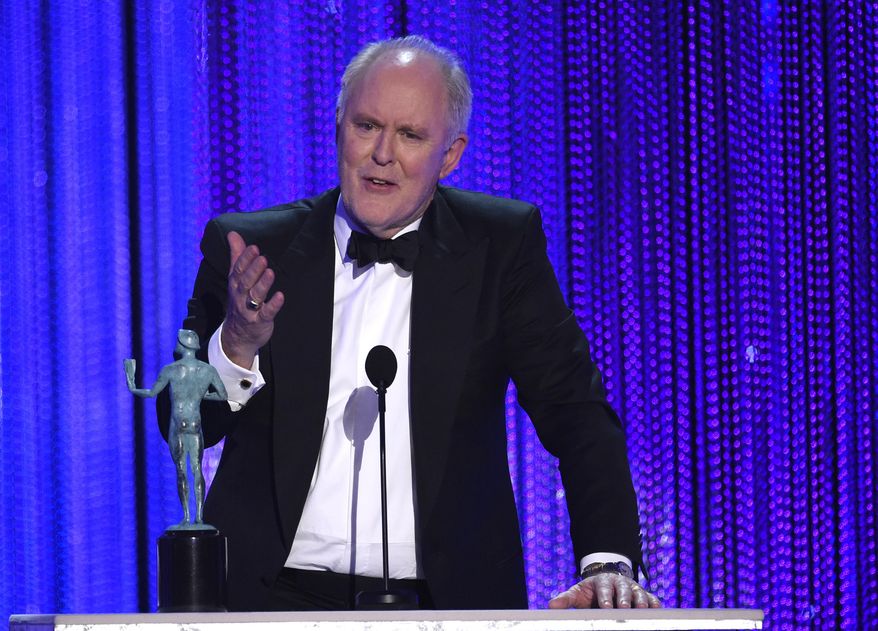 John Lithgow accepts the award for outstanding performance by a male actor in a drama series for "The Crown" at the 23rd annual Screen Actors Guild Awards at the Shrine Auditorium & Expo Hall on Sunday, Jan. 29, 2017, in Los Angeles. (Photo by Chris Pizzello/Invision/AP)