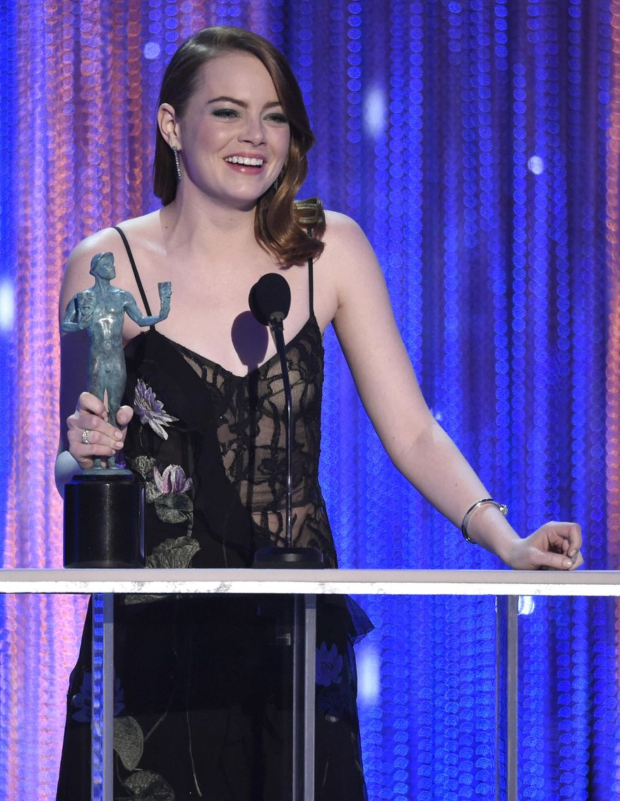 Emma Stone accepts the award for outstanding performance by a female actor in a leading role for "La La Land" at the 23rd annual Screen Actors Guild Awards at the Shrine Auditorium & Expo Hall on Sunday, Jan. 29, 2017, in Los Angeles. (Photo by Chris Pizzello/Invision/AP)