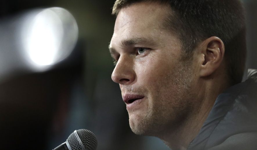 New England Patriots&#39; Tom Brady answers questions during opening night for the NFL Super Bowl 51 football game at Minute Maid Park Monday, Jan. 30, 2017, in Houston. (AP Photo/Charlie Riedel)