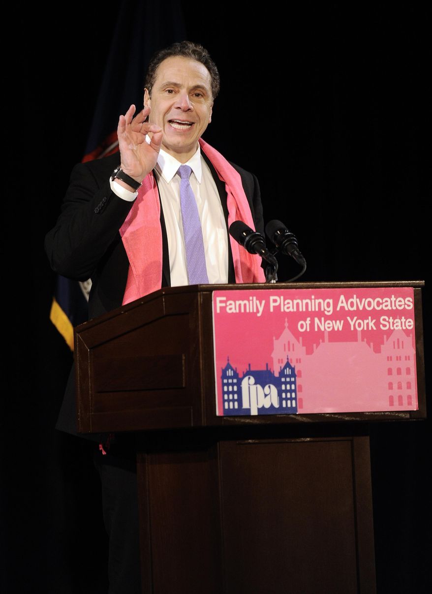New York Gov. Andrew Cuomo delivers his remarks during the Family Planning Advocates' 2017 Day of Action Rally on Monday, Jan. 30, 2017, in Albany, N.Y. Cuomo called for a state constitutional amendment guaranteeing women the right to legal abortions Monday, saying the state must work to push back against President Donald Trump and other Washington Republicans who have worried supporters of Roe v. Wade, the landmark 1973 Supreme Court decision that legalized abortion nationwide. (AP Photo/Hans Pennink)