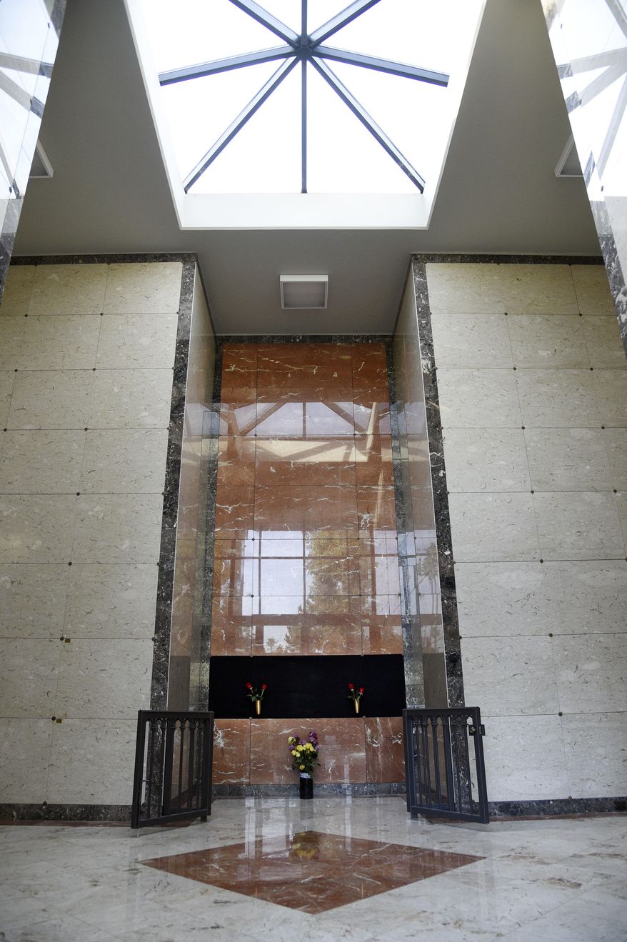 Flowers rest at the Judy Garland Pavilion, a semi-private mausoleum, at Hollywood Forever Cemetery on Monday, Jan. 30, 2017, in Los Angeles. Representatives for the cemetery and the family of Garland say her remains have been moved from New York to the mausoleum. A private unveiling ceremony of Garland's crypt will be held at a later date. (Photo by Chris Pizzello/Invision/AP)