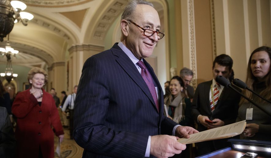 Senate Minority Leader Chuck Schumer, D-N.Y., followed by Sen. Debbie Stabenow, D-Mich., arrives for a news conference on Capitol Hill in Washington, Tuesday, Jan. 31, 2017. (AP Photo/J. Scott Applewhite) ** FILE **