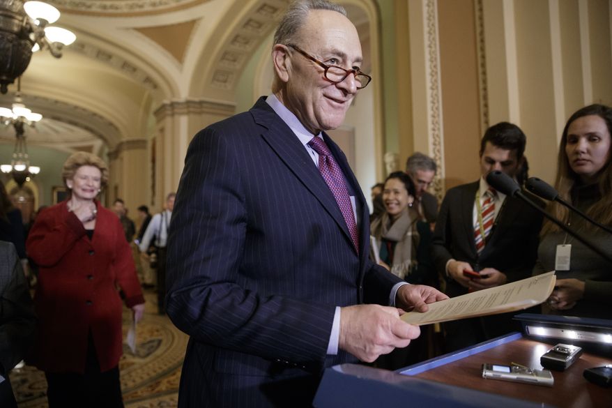 Senate Minority Leader Chuck Schumer, D-N.Y., followed by Sen. Debbie Stabenow, D-Mich., arrives for a news conference on Capitol Hill in Washington, Tuesday, Jan. 31, 2017. (AP Photo/J. Scott Applewhite) ** FILE **