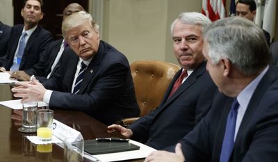 President Donald Trump listens during a meeting with pharmaceutical industry leaders in the Roosevelt Room of the White House in Washington, Tuesday, Jan. 31, 2017. From left are, PhRMA president Stephen Ubl, Merck CEO Kenneth Frazier, Trump, Celgene CEO Robert Hugin, and Amgen CEO Robert Bradway (AP Photo/Evan Vucci)