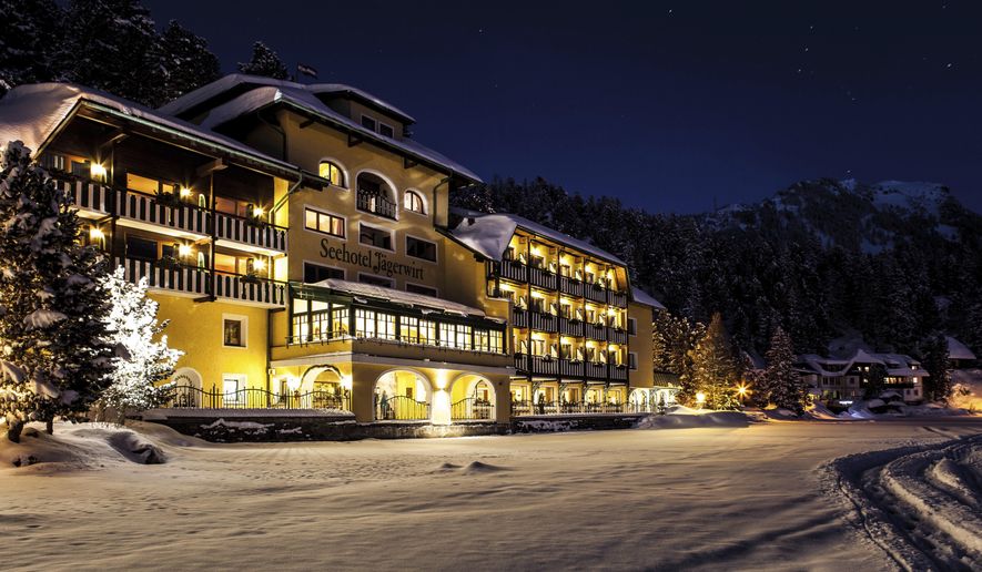 This photo, dated Dec. 2016, shows the Romantik Seehotel Jaegerwirt, a hotel in the Austrian Alps at Turracher Hoehe. The hotel’s management says it is ditching its electronic room cards for the old-fashioned locks and keys after being repeatedly targeted by hackers. One recent intrusion resulted in new guests being briefly unable to access their rooms. (Seehotel Jaegerwirt via AP)