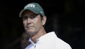 FILE - In this Dec. 5, 2015, file photo, Baylor coach Art Briles stands in the tunnel before the team&#39;s NCAA college football game against Texas in Waco, Texas. Former Baylor coach Briles conceded months ago that the sexual assault scandal that led to his firing likely ended his career. That&#39;s not the case for some of his former assistants, including his son Kendal Briles. (AP Photo/LM Otero, File)