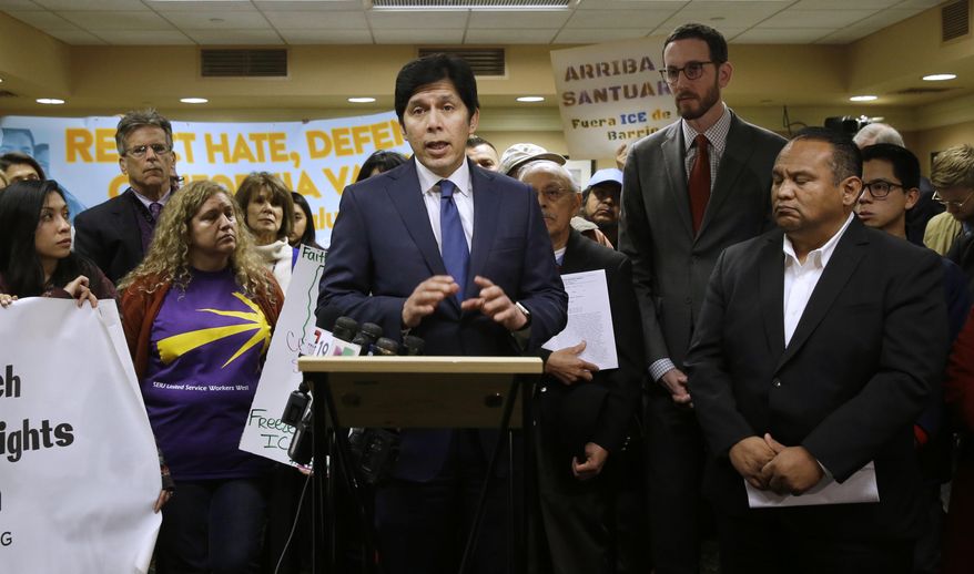 State Sen. President Pro Tem Kevin de Leon, D-Los Angeles discusses his measure SB54 after the Senate Pubic Safety Committee passed the bill, Tuesday, Jan. 31, 2017, in Sacramento, Calif. If approved by the Legislature and signed by the governor, SB54 would prohibit local law enforcement from cooperating with federal immigration authorities. (AP Photo/Rich Pedroncelli)