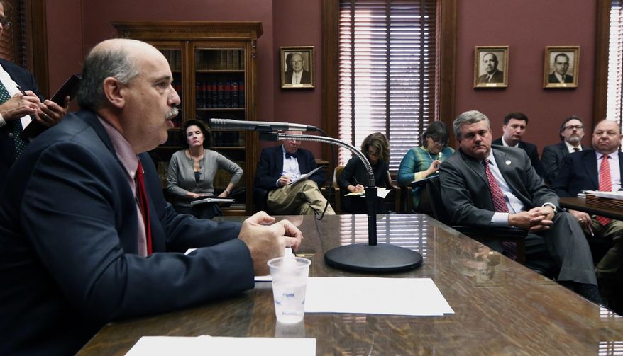 House Education Committee member Richard Bennett, R-Long Beach, asks members of the House Appropriations Committee to pass House Bill No. 1294, legislation which brings forward code sections of the Mississippi Adequate Education Program, Tuesday, Jan. 31, 2017, at the Capitol in Jackson, Miss. The bill, also called a "dummy bill," passed through the committee, making it possible for lawmakers to amend the law in the future despite having no new language ready by deadline day. (AP Photo/Rogelio V. Solis)