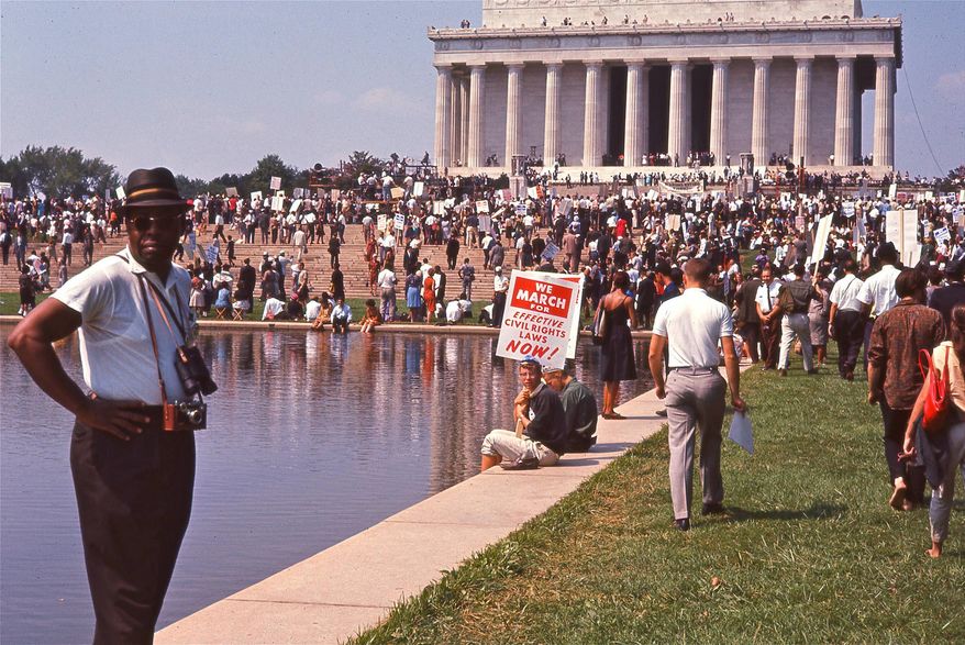 This image released by Magnolia Pictures shows people gathering at the Lincoln Memorial for the March on Washington, featured in the film, "I Am Not Your Negro." (Magnolia Pictures via AP)