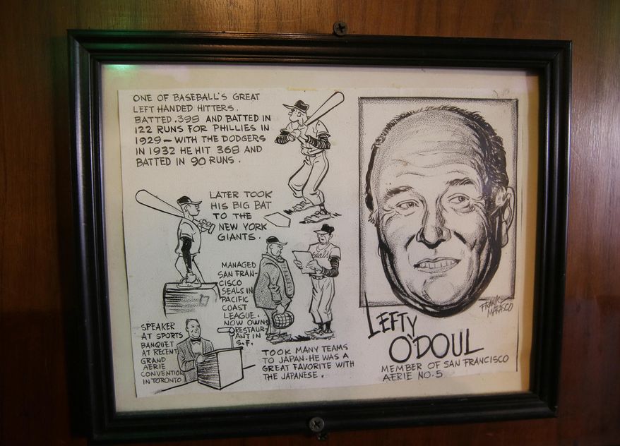 In this photo taken Friday, Jan. 13, 2017, a sketch highlights many baseball achievements of Lefty O'Doul at Lefty O'Doul's restaurant and lounge in San Francisco. The historic sports bar and hofbrau, filled with baseball memorabilia, is set to close because of a landlord dispute in February. The restaurant opened in 1958 and is seeking a new home. (AP Photo/Eric Risberg)