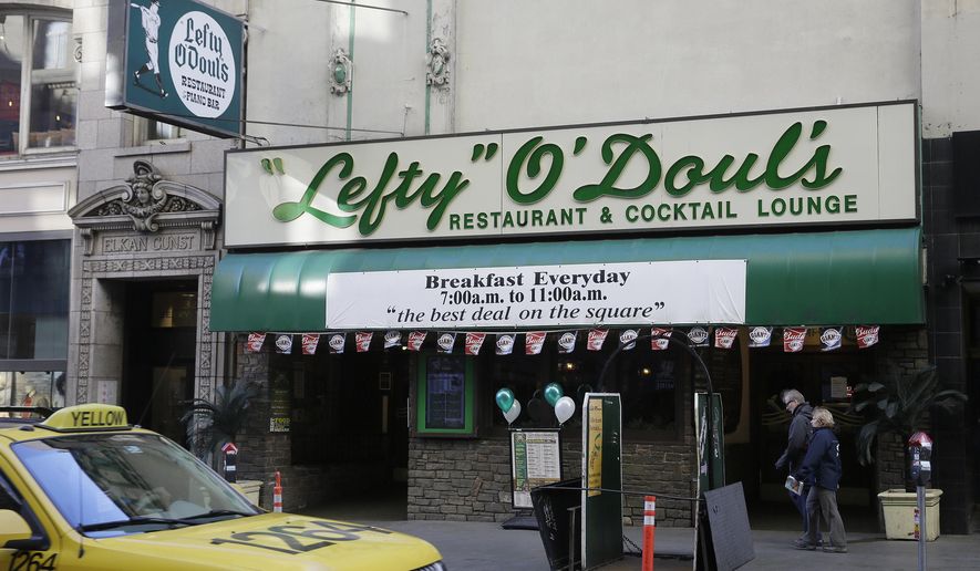This photo taken Friday, Jan. 13, 2017, shows Lefty O'Doul's restaurant and lounge near Union Square in San Francisco. The historic baseball memorabilia and piano bar beloved by locals and tourists is set to close this week after its lease expires. Lefty O’Doul’s may return to downtown Union Square, but it's unclear who will be in charge as the bar's longtime operator and building owner are fighting over ownership. The establishment's final day is Wednesday, Feb. 1. (AP Photo/Eric Risberg)